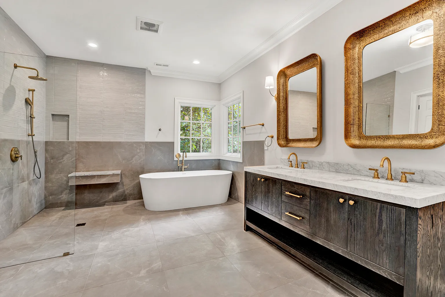 Luxury bathroom remodel with walk-in shower and floating wood vanity